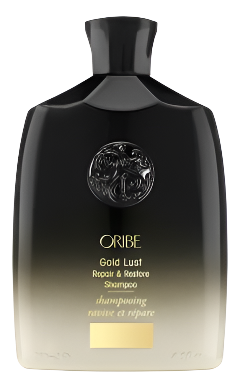 Oribe Gold Lust Repair & Restore shampoo bottle on a white background